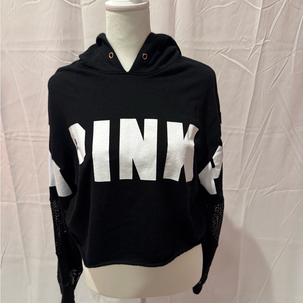 Pink small black crop sweatshirt with mesh half sleeve.